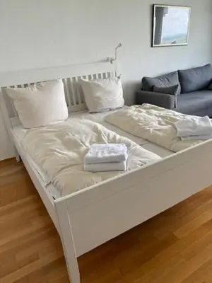 Ein Bett oder Betten in einem Zimmer der Unterkunft Apartment Himmlischer Ausblick