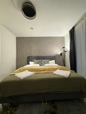 Ein Bett oder Betten in einem Zimmer der Unterkunft Eleganz im Zentrum, Ostsee, Lübeck & Hotspots nah!