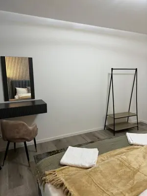 Ein Bett oder Betten in einem Zimmer der Unterkunft Eleganz im Zentrum, Ostsee, Lübeck & Hotspots nah!