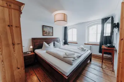 Ein Bett oder Betten in einem Zimmer der Unterkunft Apartments in der Blocksquerstraße