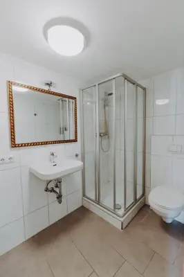 Ein Badezimmer in der Unterkunft Apartments in der Blocksquerstraße