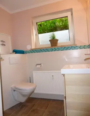 Ein Badezimmer in der Unterkunft Achtern Huus 6 7