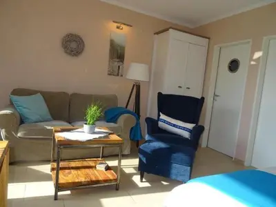 Ein Sitzbereich in der Unterkunft Achtern Huus 6 7