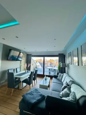 Ein Sitzbereich in der Unterkunft Ferienwohnung Strandperle - nur 150m zum Strand