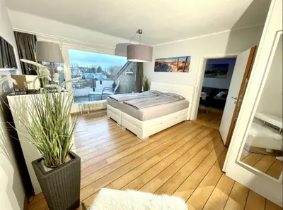 Ein Bett oder Betten in einem Zimmer der Unterkunft Ferienwohnung Strandperle - nur 150m zum Strand