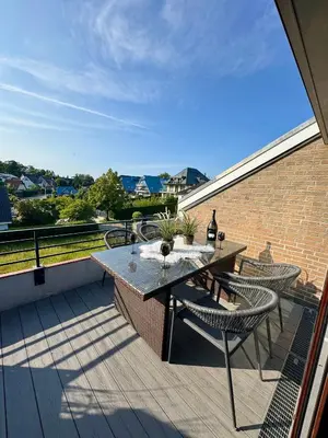 Ein Balkon oder eine Terrasse in der Unterkunft Ferienwohnung Strandperle - nur 150m zum Strand
