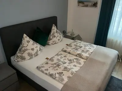 Ein Bett oder Betten in einem Zimmer der Unterkunft Baltic Stuben Hotel Garni Travemünde