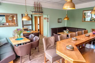 Ein Sitzbereich in der Unterkunft Baltic Stuben Hotel Garni Travemünde