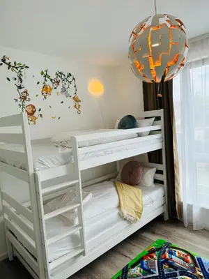 Ein Bett oder Betten in einem Zimmer der Unterkunft Perfektes Familiendomizil 15min nach Lübeck und Ostsee
