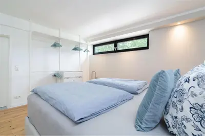 Ein Bett oder Betten in einem Zimmer der Unterkunft Panoramic Sierksdorf App C03-10