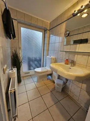 Ein Badezimmer in der Unterkunft Ferienwohnung Raphael Timmendorfer Strand Gorch-Fock-Straße