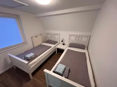 Ein Bett oder Betten in einem Zimmer der Unterkunft Kuschelige, zentrale, stilvolle Wohnung