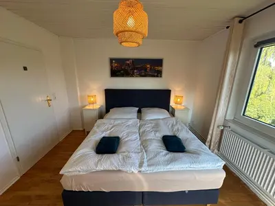 Ein Bett oder Betten in einem Zimmer der Unterkunft Haus Königsee 