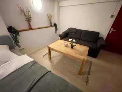 Ein Sitzbereich in der Unterkunft Haus Königsee 