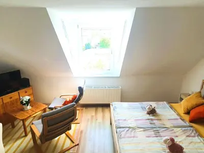 Ein Sitzbereich in der Unterkunft Ferienwohnung Kost
