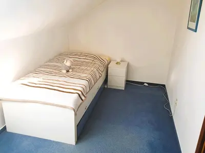 Ein Bett oder Betten in einem Zimmer der Unterkunft Ferienwohnung Kost