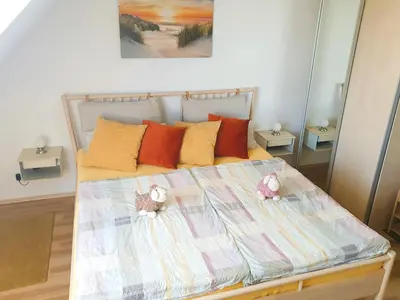 Ein Bett oder Betten in einem Zimmer der Unterkunft Ferienwohnung Kost