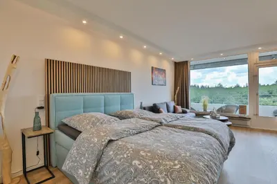 Ein Bett oder Betten in einem Zimmer der Unterkunft Strandkoje No 6