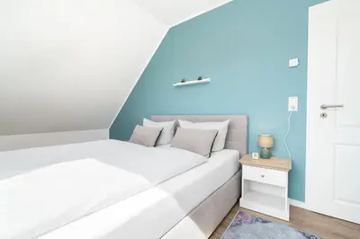 Ein Bett oder Betten in einem Zimmer der Unterkunft Sunseeker House No 1