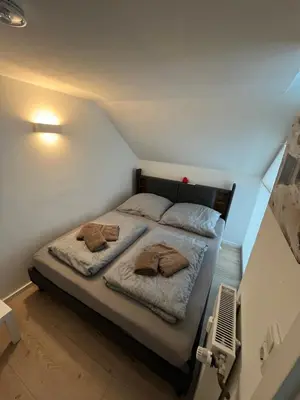 Ein Bett oder Betten in einem Zimmer der Unterkunft Meeresrauschen - Strandnah und ruhig