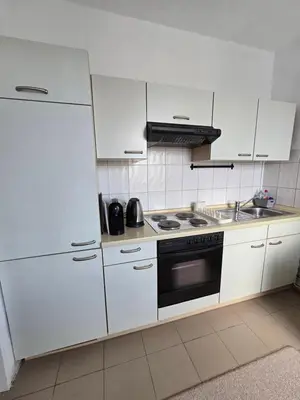 Küche/Küchenzeile in der Unterkunft Charmante Ferienwohnung im Herzen von Lübeck