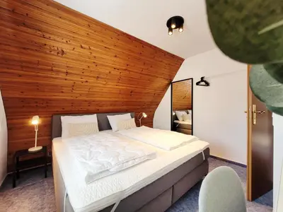 Ein Bett oder Betten in einem Zimmer der Unterkunft Ferienhaus mit Garten und idyllischer Ruhe