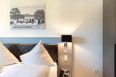 Ein Bett oder Betten in einem Zimmer der Unterkunft Ferienwohnung Pier 51 Scharbeutz
