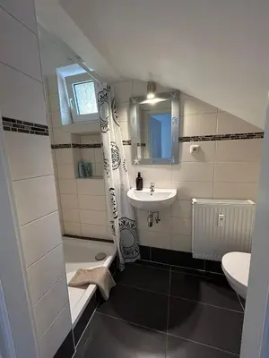 Ein Badezimmer in der Unterkunft Central Cozy 2 Apartment Lübeck