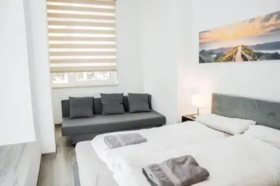 Ein Bett oder Betten in einem Zimmer der Unterkunft Central Cozy Home 2 Lübeck
