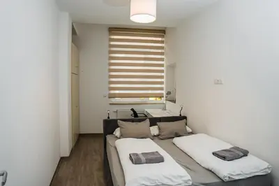 Ein Bett oder Betten in einem Zimmer der Unterkunft Central Cozy Home 2 Lübeck