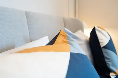 Ein Bett oder Betten in einem Zimmer der Unterkunft Strandgänger App 110