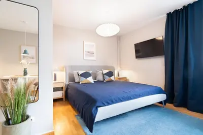 Ein Bett oder Betten in einem Zimmer der Unterkunft Strandgänger App 110
