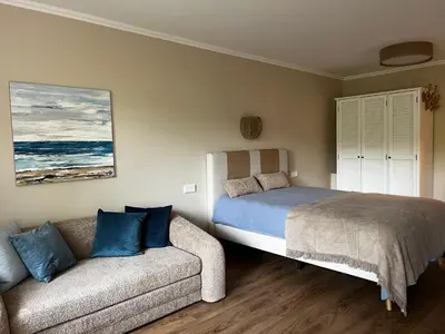 Ein Bett oder Betten in einem Zimmer der Unterkunft Strandbude-Scharbeutz 30 m vom Strand