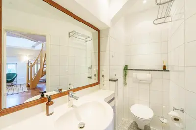 Ein Badezimmer in der Unterkunft Maisonette am Holstentor mit Dachterrasse und Heimkino