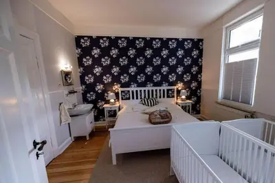 Ein Bett oder Betten in einem Zimmer der Unterkunft Ferienwohnung LOTTTALEBEN