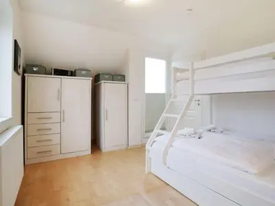 Ein Bett oder Betten in einem Zimmer der Unterkunft Haus am Meer