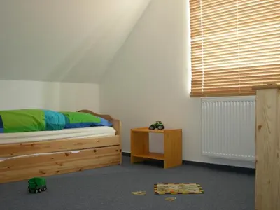 Ein Bett oder Betten in einem Zimmer der Unterkunft Löönboom