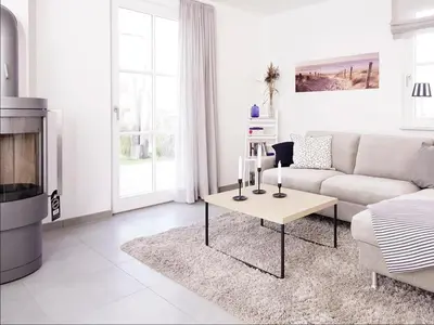 Ein Sitzbereich in der Unterkunft Kranich Ferienhaus