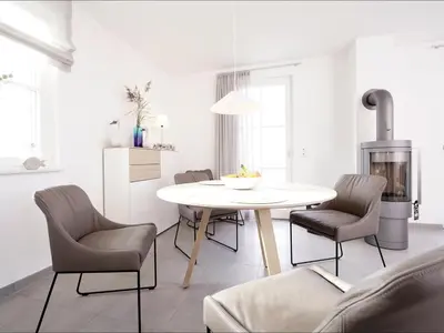 Ein Sitzbereich in der Unterkunft Kranich Ferienhaus