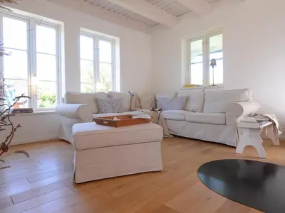 Ein Sitzbereich in der Unterkunft Naturlust Ferienhaus