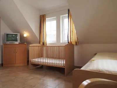 Ein Bett oder Betten in einem Zimmer der Unterkunft Ostseeblick Ferienhaus
