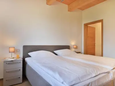 Ein Bett oder Betten in einem Zimmer der Unterkunft Ostseehaus Sabine