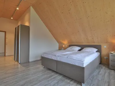 Ein Bett oder Betten in einem Zimmer der Unterkunft Ostseehaus Sabine