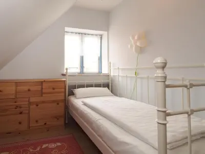 Ein Bett oder Betten in einem Zimmer der Unterkunft Sternschnuppe
