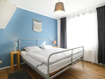 Ein Bett oder Betten in einem Zimmer der Unterkunft Whg Bremen, Groß Schwansee