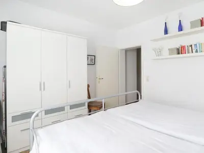 Ein Bett oder Betten in einem Zimmer der Unterkunft Whg Bremen, Groß Schwansee
