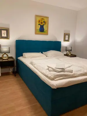 Ein Bett oder Betten in einem Zimmer der Unterkunft Central