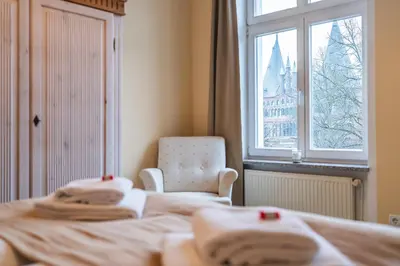 Ein Bett oder Betten in einem Zimmer der Unterkunft Apartment mit Wasserblick