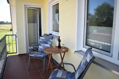 Ein Balkon oder eine Terrasse in der Unterkunft Haus zum Strand Muschel