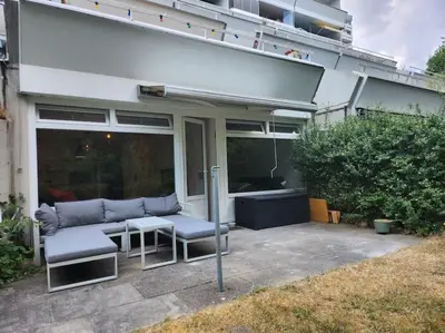 Ein Garten an der Unterkunft Ruhige Terrassenwohnung in Strandnähe Sierksdorf für bis zu 4 Personen